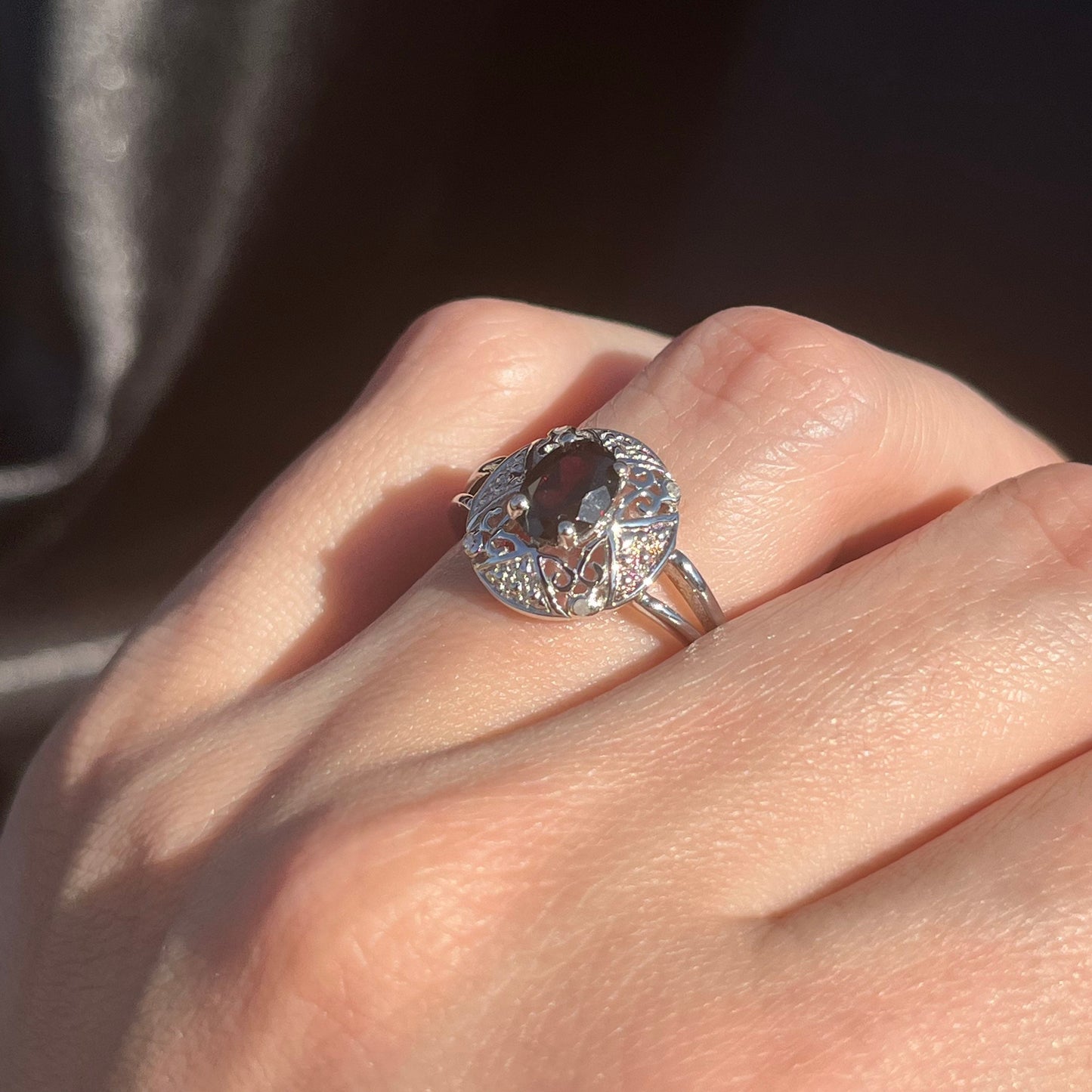 Red Garnet ring in natural light